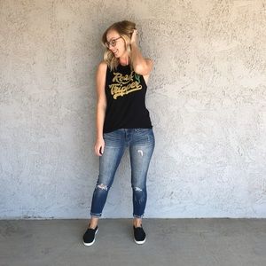 Distressed denim jeans